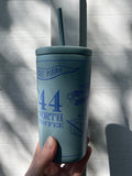 Light blue cold cup with darker blue 44 North Coffee Stonecutter artwork logo with a shadowed white background